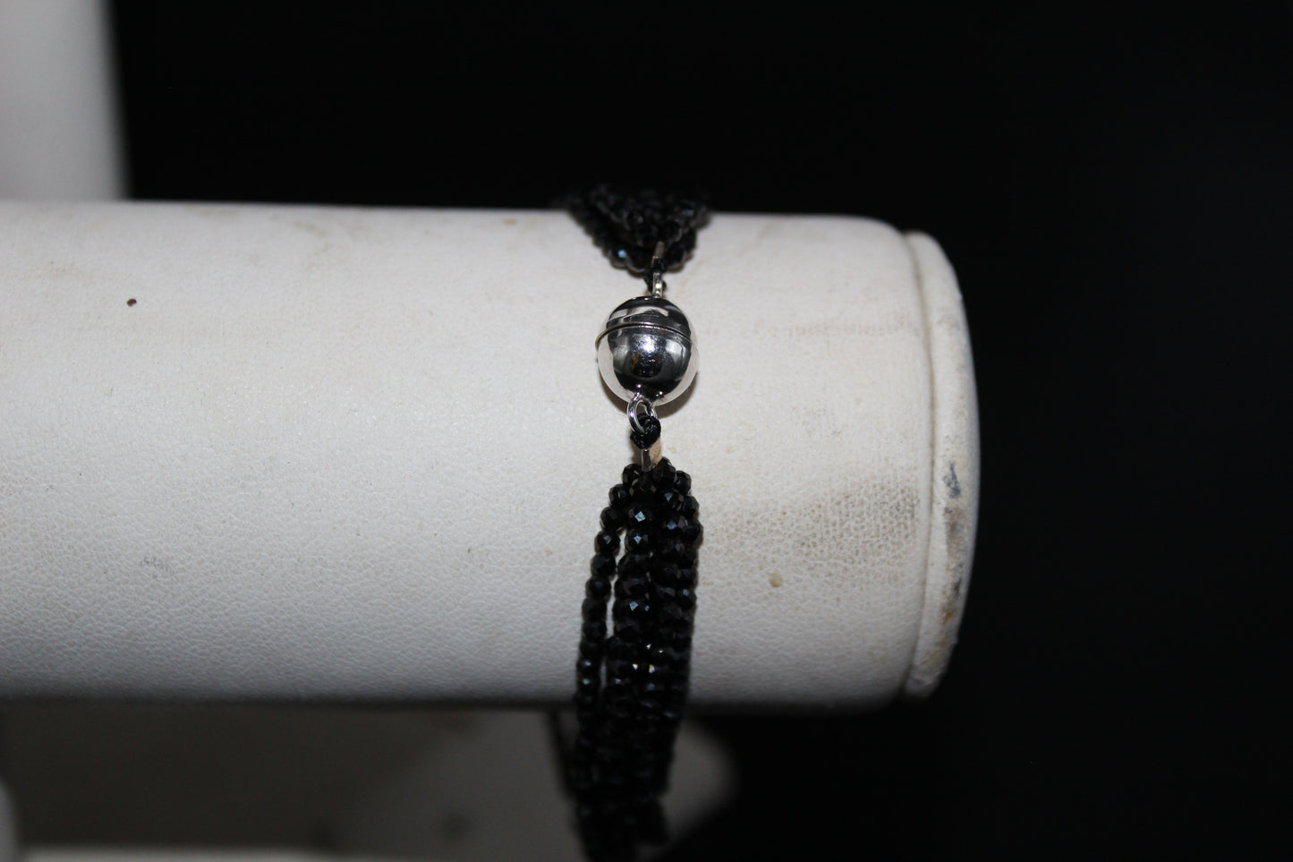 Six Strand Faceted Black Spinel Bracelet