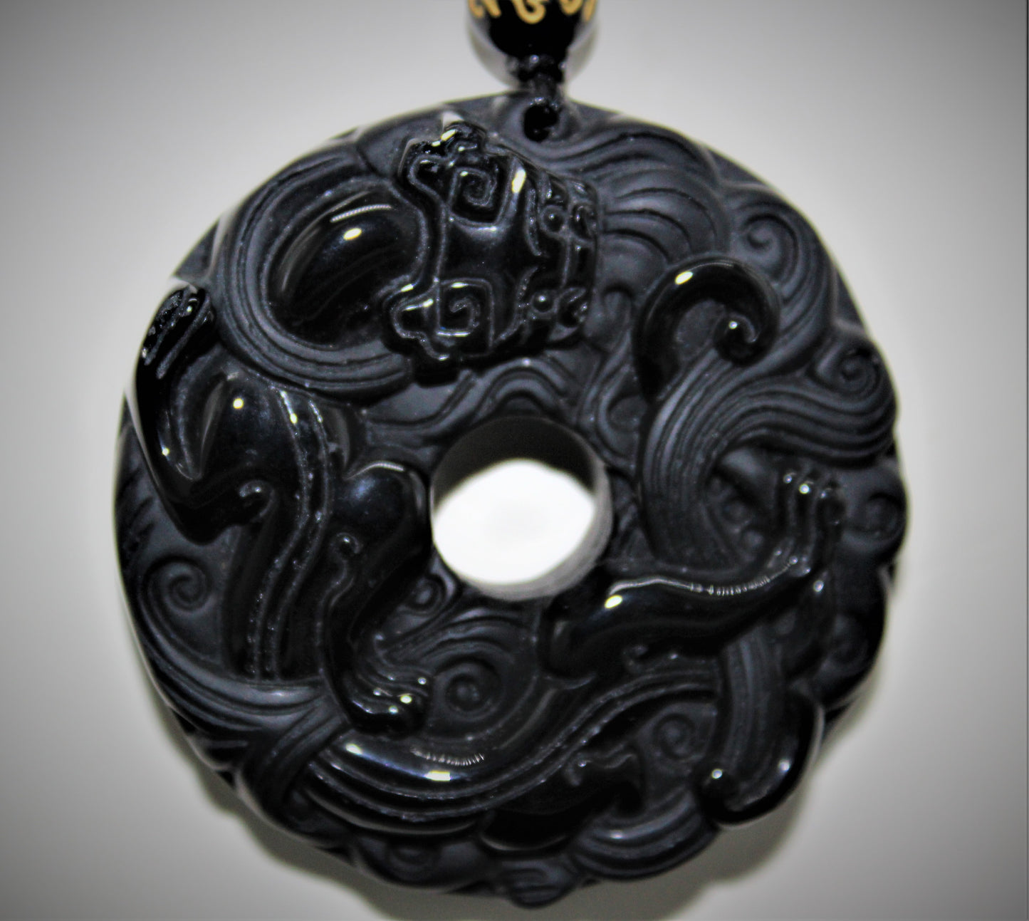 Carved Obsidian Disc with bead accents