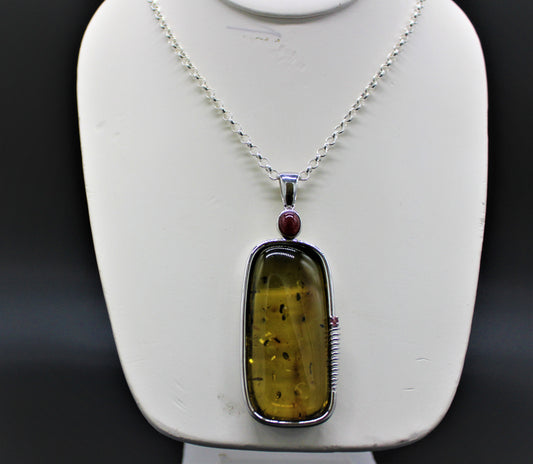 Amber Pendant with Ruby and Sapphire Accents