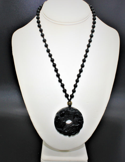 Carved Obsidian Disc with bead accents